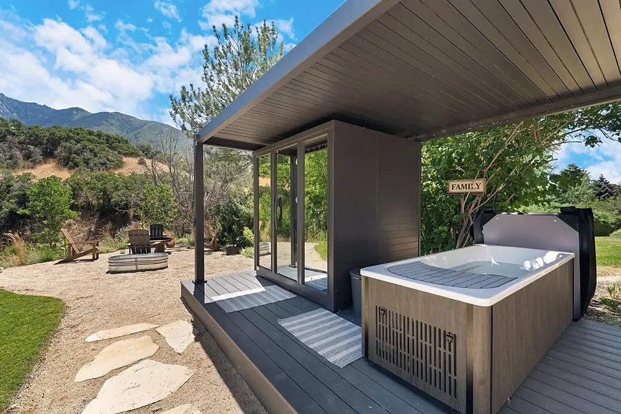 Elysium outdoor sauna pavilion with hot tub and mountain views