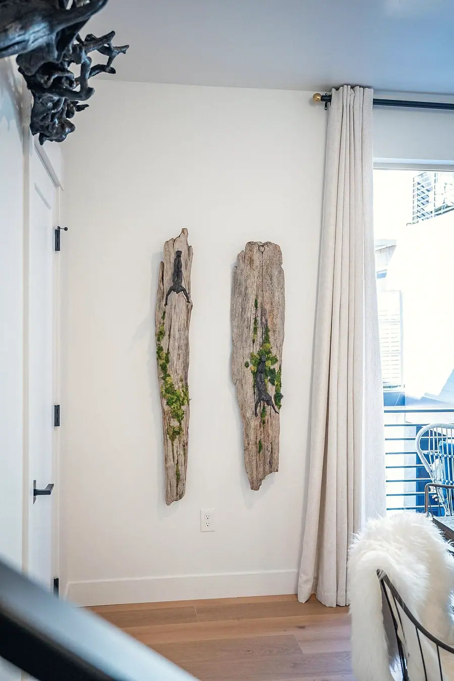 Silver Creek wall art with driftwood panels, moss, and climbing figures