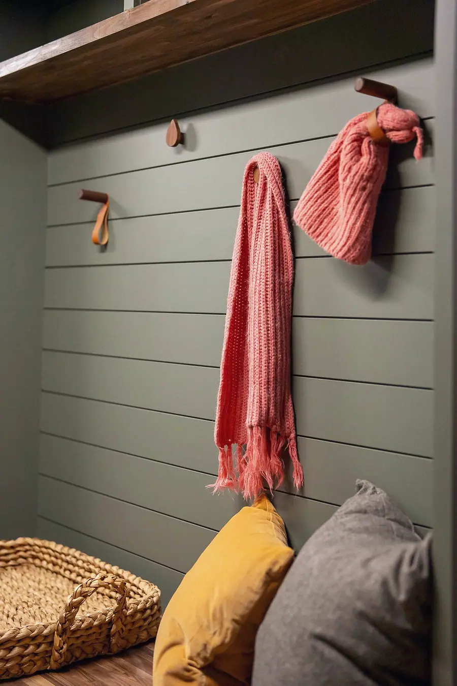 6468 S Brookstone mudroom detail with sage shiplap, pink knit scarf, and woven basket