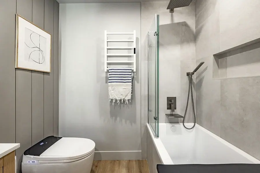 6468 S Brookstone spa bath with smart toilet, heated towel rack, and soaking tub